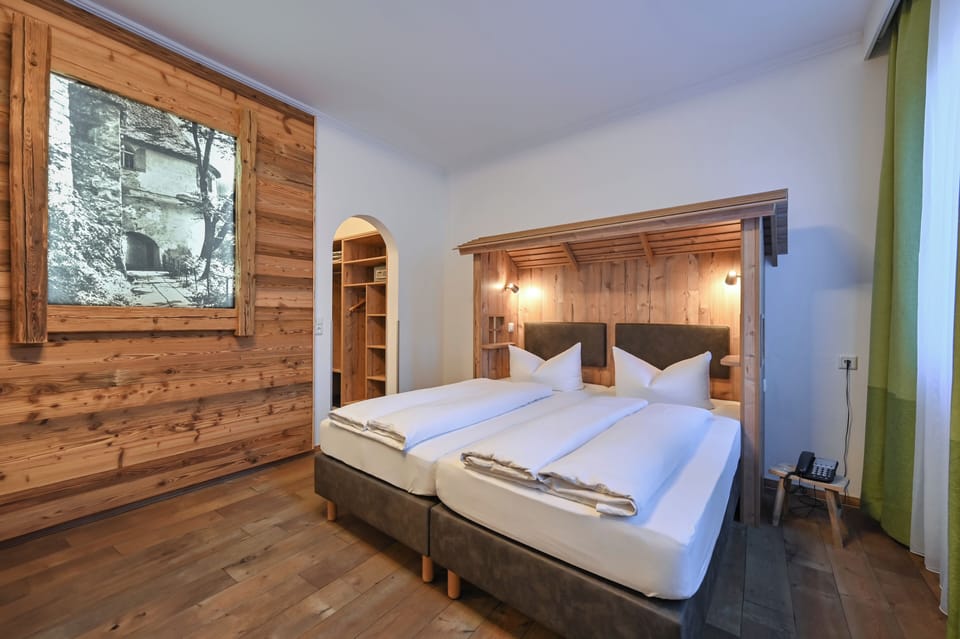 Family Triple Room | Hypo-allergenic bedding, in-room safe, desk, free WiFi