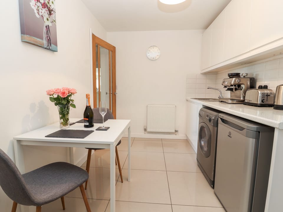 Fridge, electric kettle, toaster, cookware/dishes/utensils