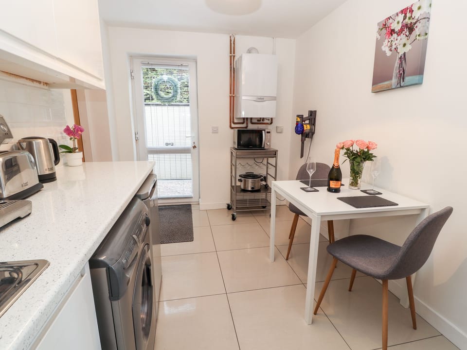 Fridge, electric kettle, toaster, cookware/dishes/utensils
