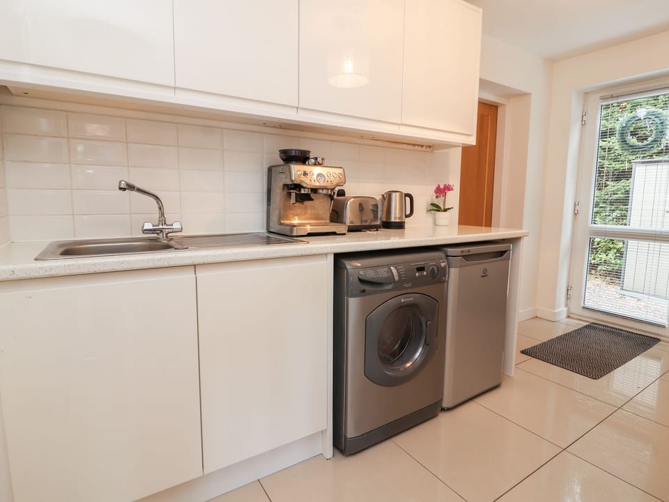 Fridge, electric kettle, toaster, cookware/dishes/utensils