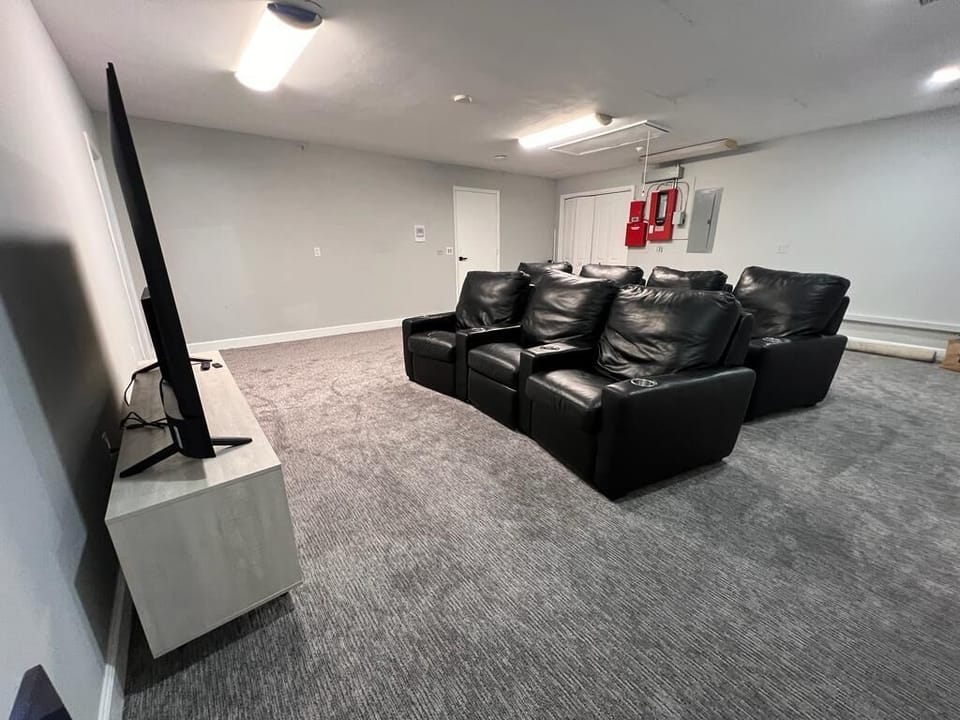 Family Movie Nights: Get cozy and create unforgettable moments with our dedicated movie-watching area. 