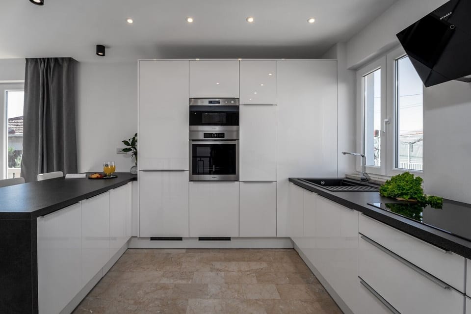 There is a fully equipped and very modern kitchen with all the amenities you need.