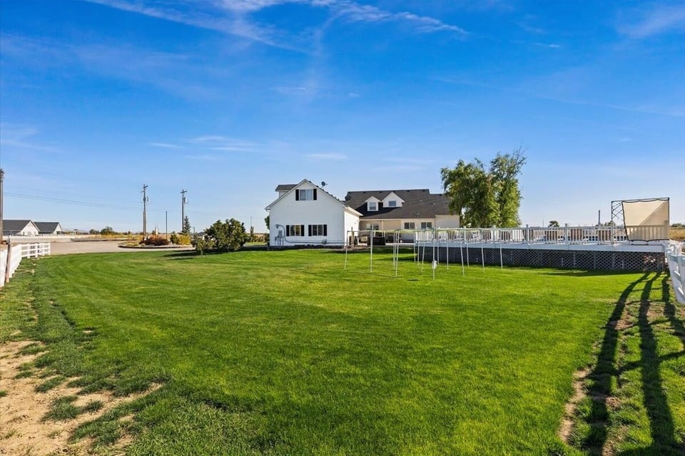 Large grassy area North of the Pool