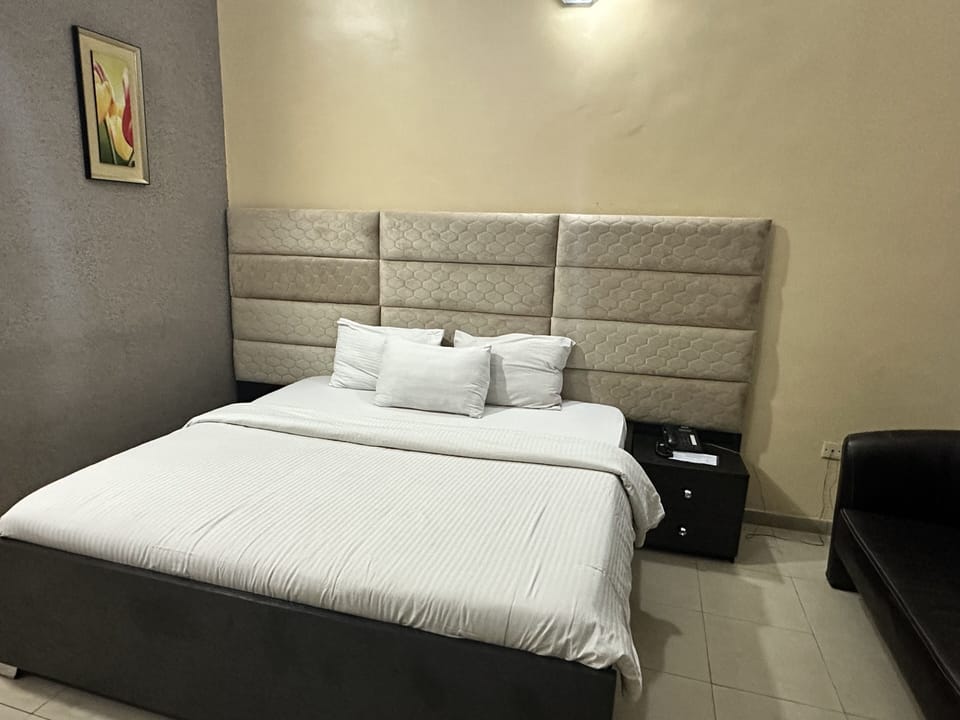 Deluxe Room | Down comforters, memory foam beds, desk, WiFi (free)
