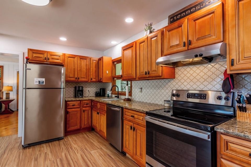 Fully stocked kitchen with coffee maker, air fryer and instant kettle.