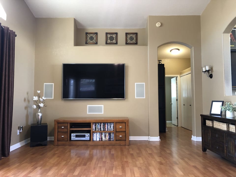 Living room with surround sound for the game or movie night. 