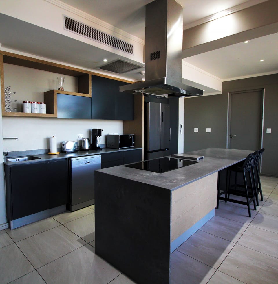 Luxury Penthouse | Private kitchen | Full-size fridge, microwave, oven, dishwasher