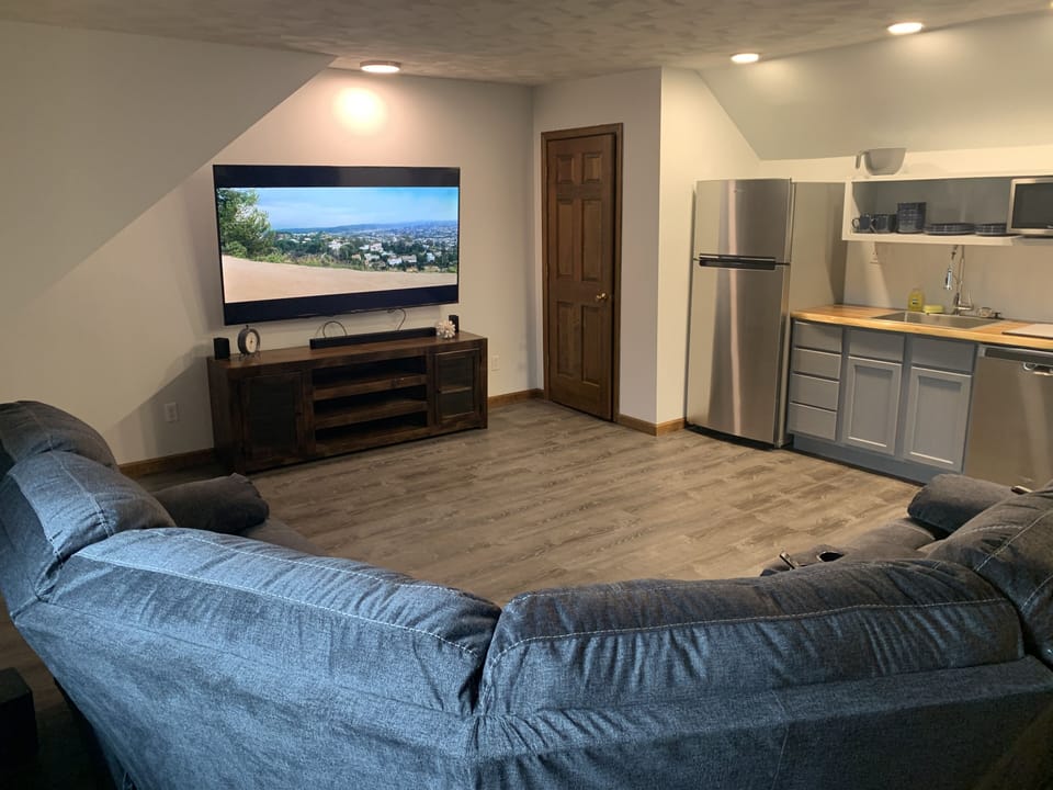 Bonus room theatre area with 75 inch tv and surround sound. 
