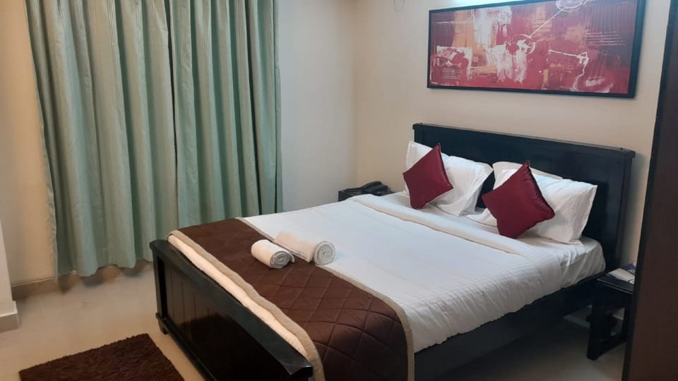 Deluxe Double Room | Individually furnished, desk, laptop workspace, blackout drapes