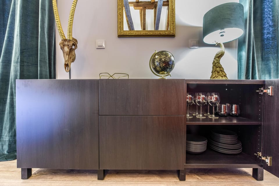 Furniture detail with complete crockery