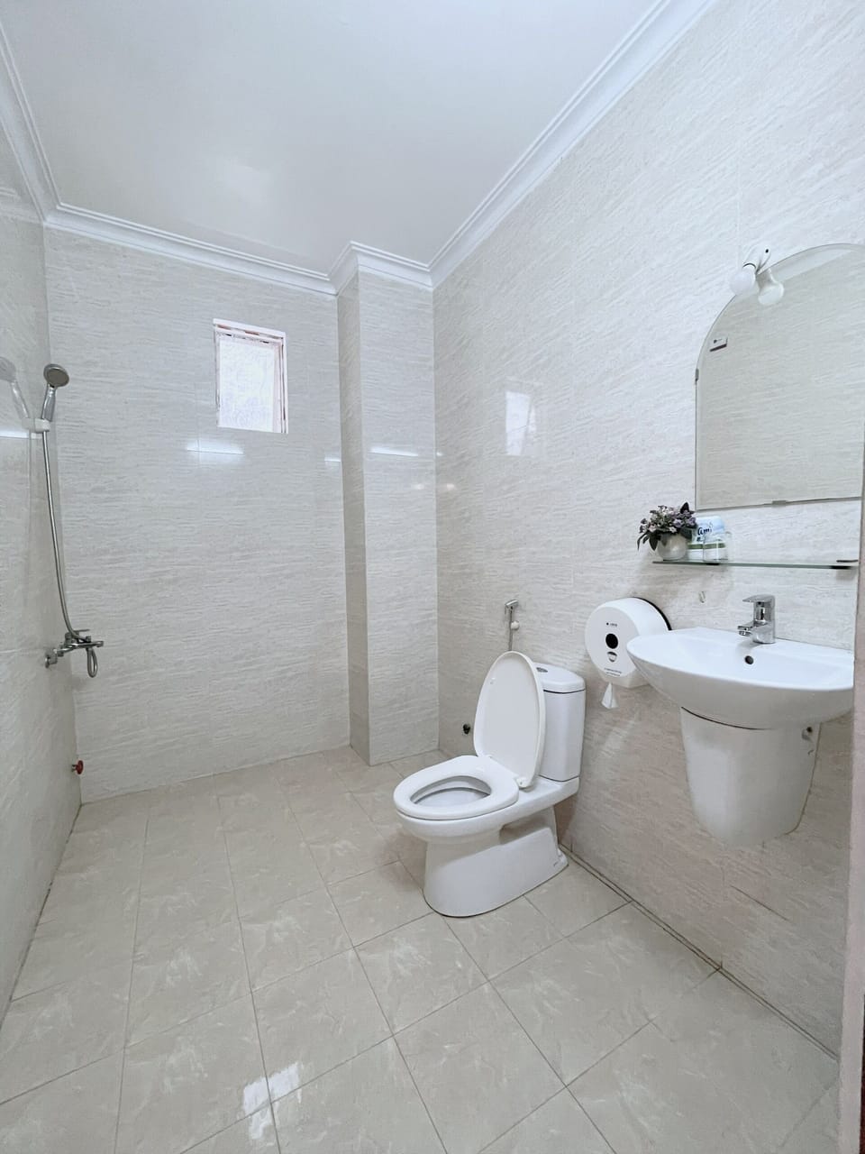 Shower, hydromassage showerhead, designer toiletries, slippers