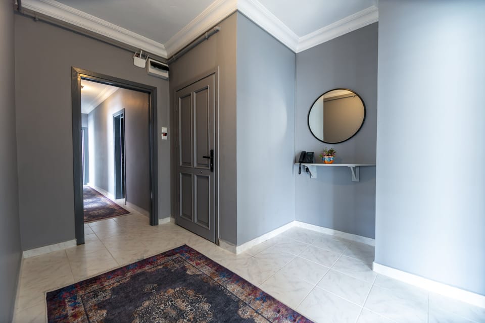 Family Suite with Balcony | Living area | 47-inch Smart TV with satellite channels, TV, printers
