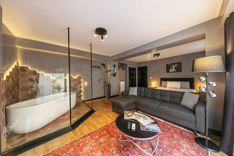 Romantic Studio Suite, 1 Queen Bed with Sofa bed, Garden View | Living area | 47-inch Smart TV with satellite channels, TV, printers