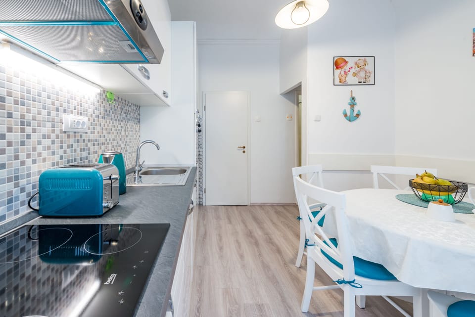 Apartment (Two-Bedroom Apartment) | Private kitchen | Fridge