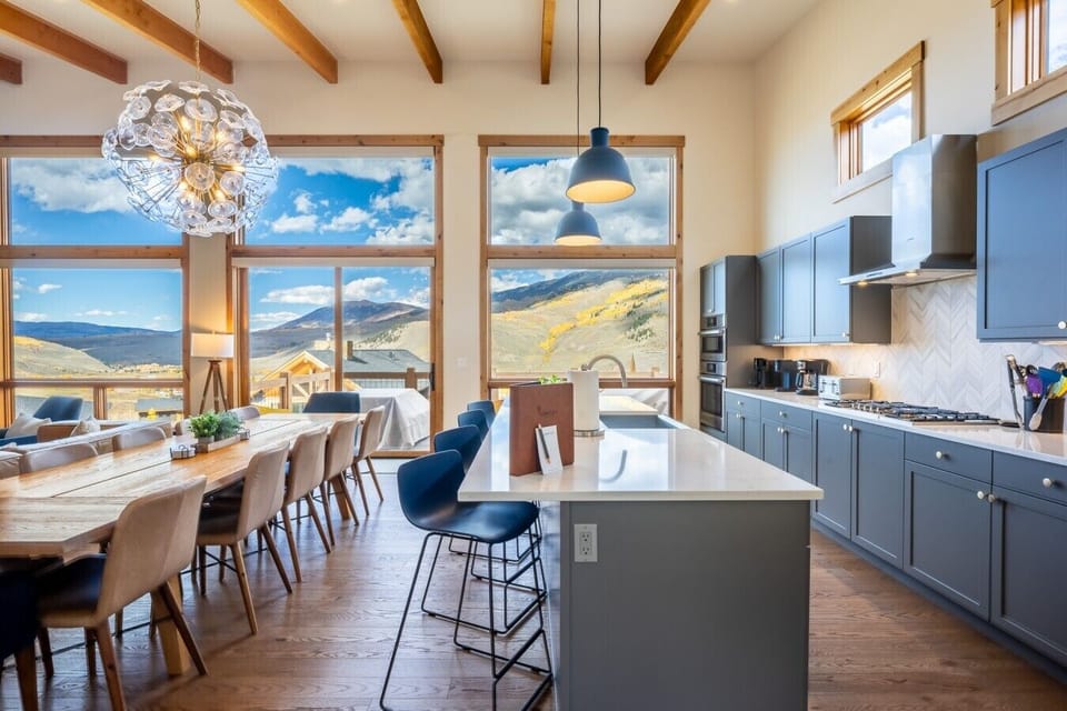 Open concept kitchen, dining and living areas