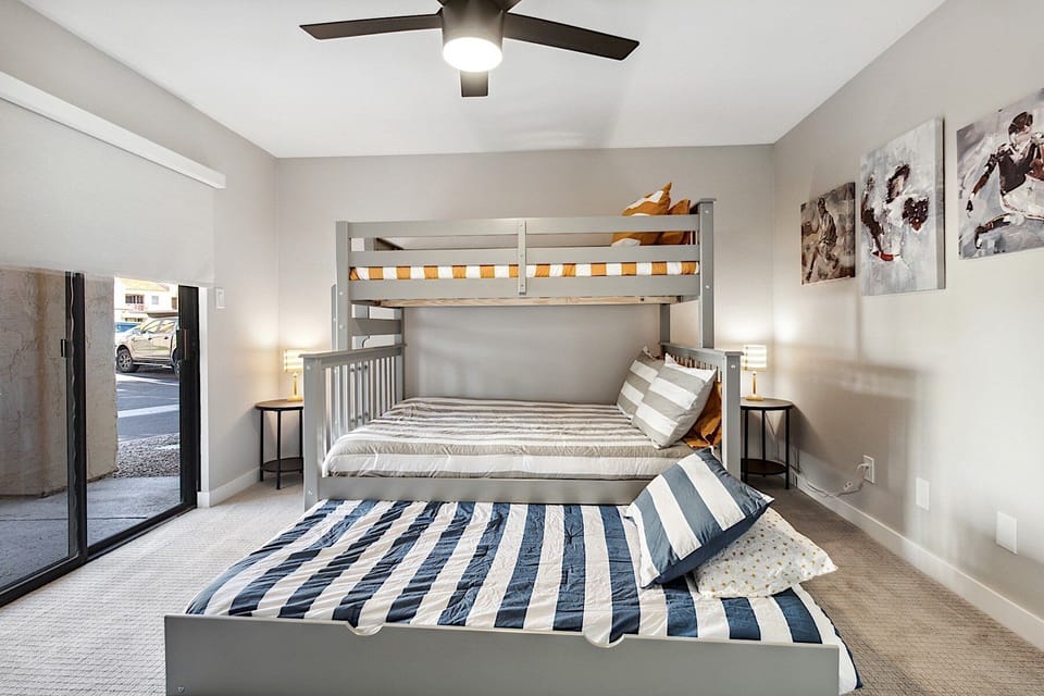 Second bedroom bunk bed. Twin over full bed with pull-out twin size trundle at the bottom. Private patio entrance, walk-in closet, attached bathroom.