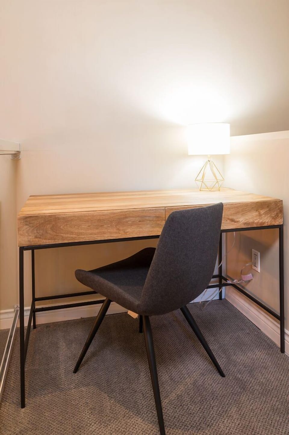 A great bonus sleeping space with a desk for all your work needs.
