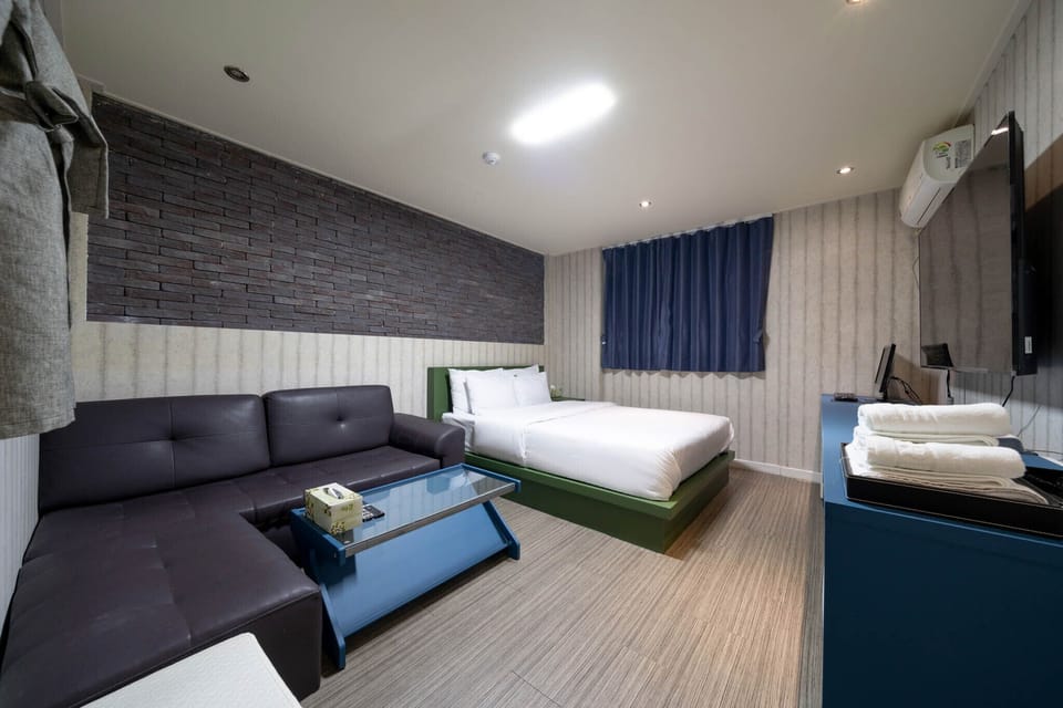 Premium bedding, blackout drapes, soundproofing, free WiFi