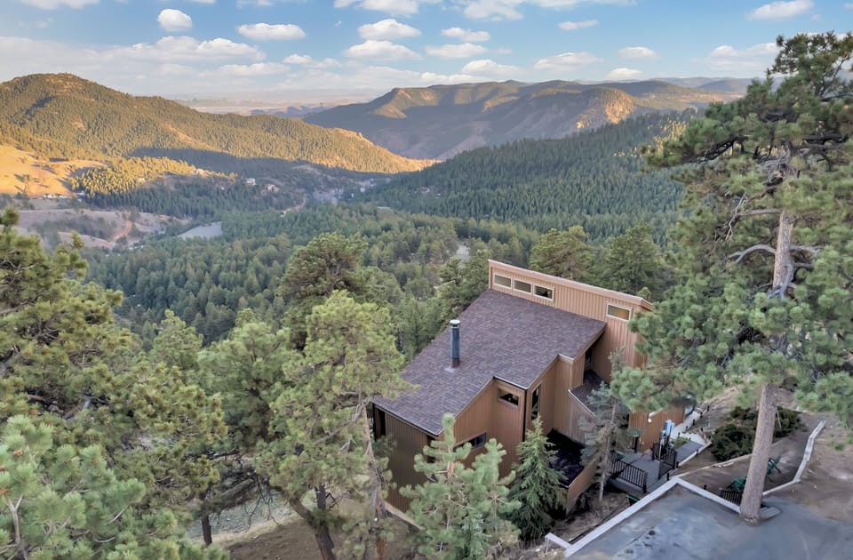 Experience one of a kind city & mountain views in this newly remodeled cabin!