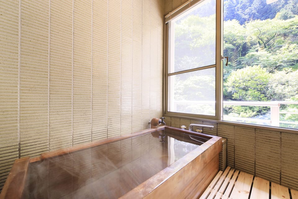 Japanese-style room 12 tatami private hot spring bath, Non Smoking | Bathroom | Separate tub and shower, hair dryer, towels