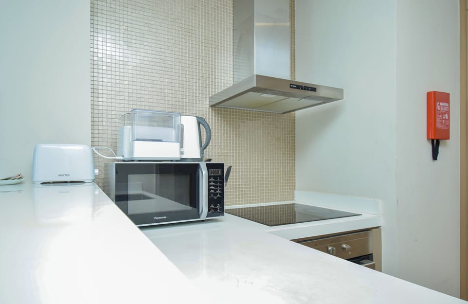 Signature Apartment, Non Smoking, Balcony | Private kitchenette | Full-size fridge, microwave, oven, stovetop