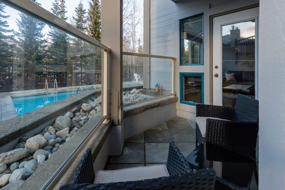 Patio - Outdoor seating overlooking the communal pool.