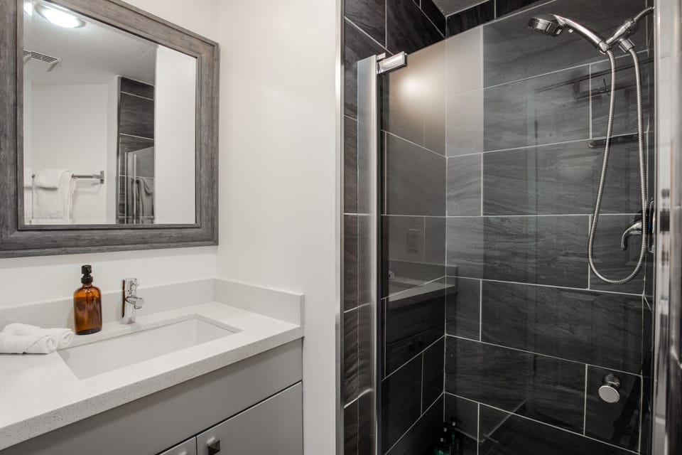 Second Bathroom - The shared second bathroom offers a single stand-up shower.