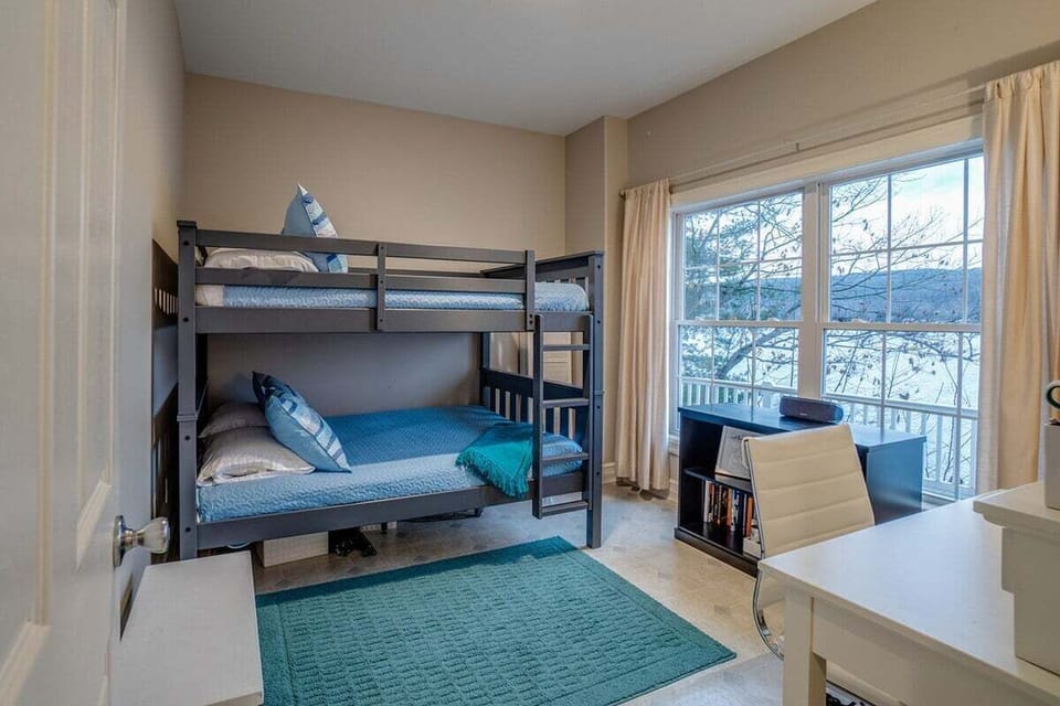 Bedroom 4 on the lower level with 2 Double beds/bunk