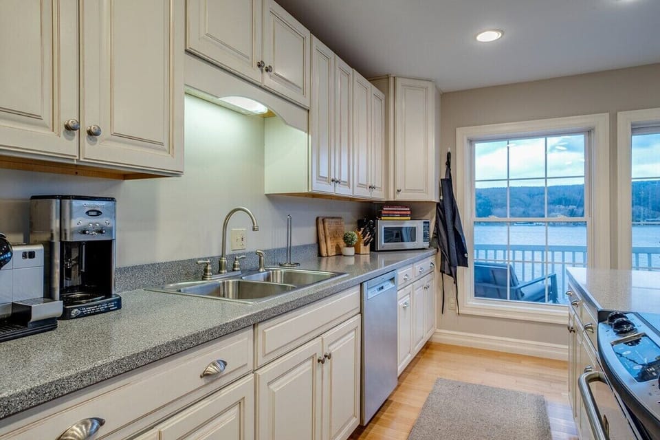 Kitchen is fully stocked with cookware/dinnerware