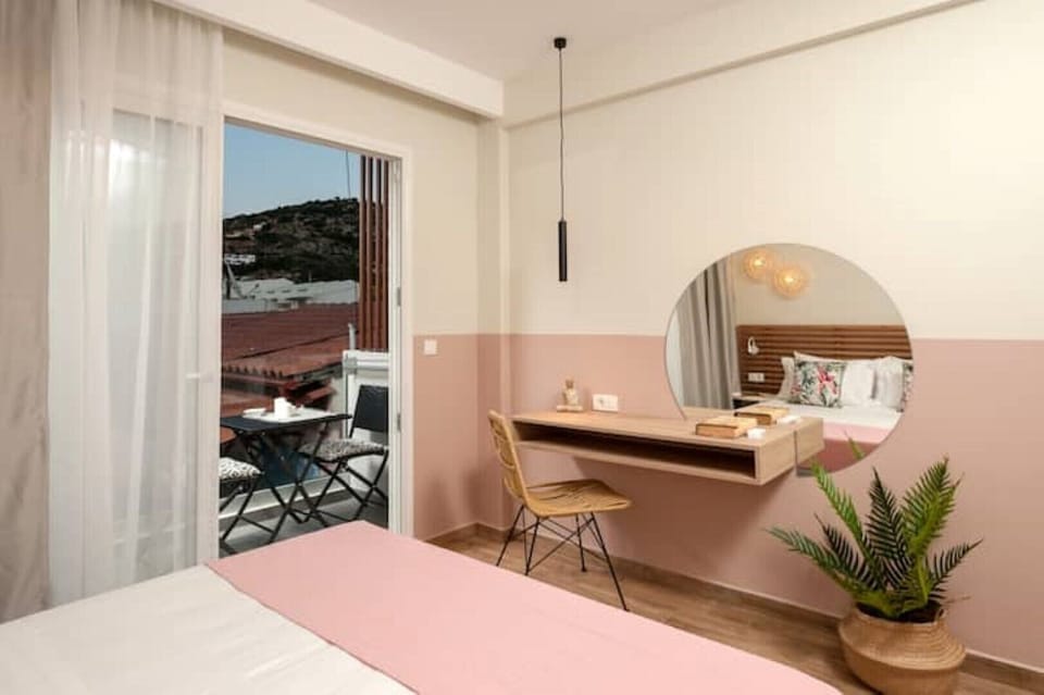 Pink apartment bedroom and balcony