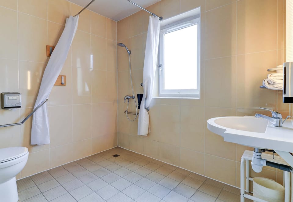 Shower, hair dryer (on request), towels