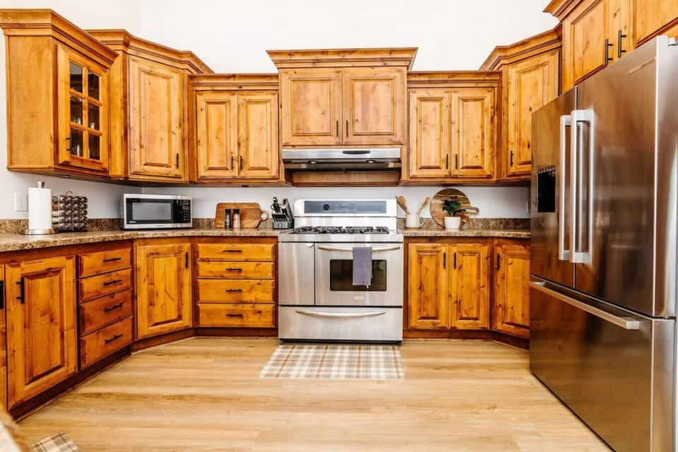Commercial quality gas range and Bosch fridge