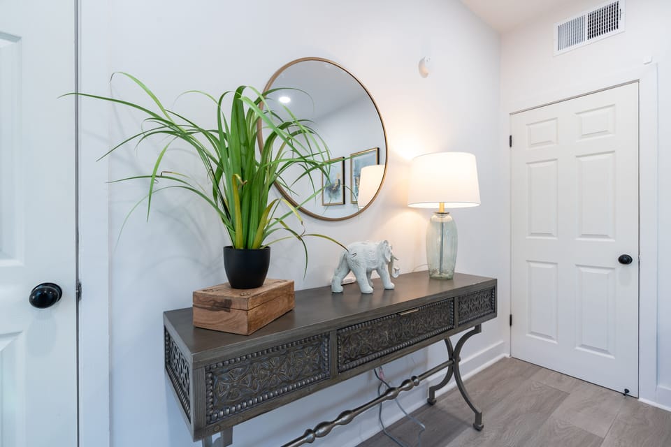 Bed 2 features an extra mirror, we know you all can't use the bathroom at once!