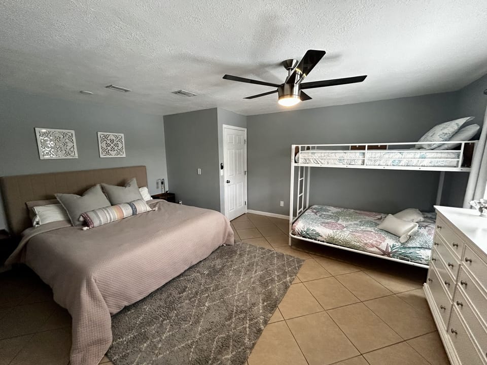 King bed and Twin over Full bunk bed.