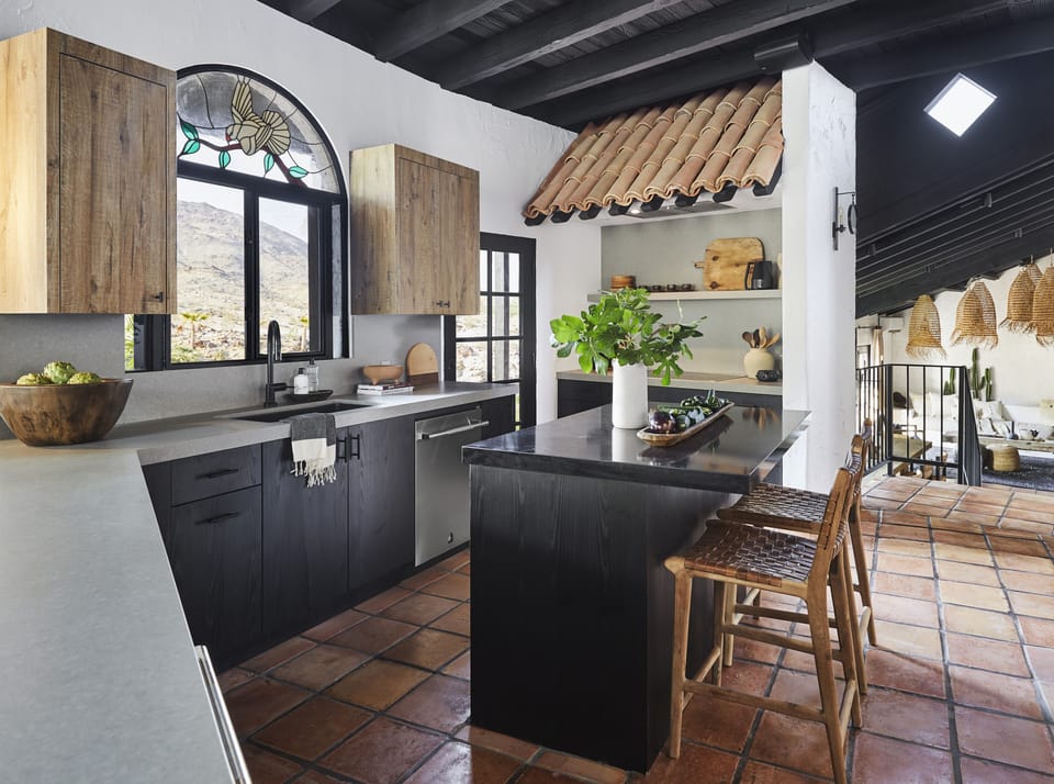 Kitchens always get a lot of love (and a lot of spills!), so we used quartzite, which is really durable.