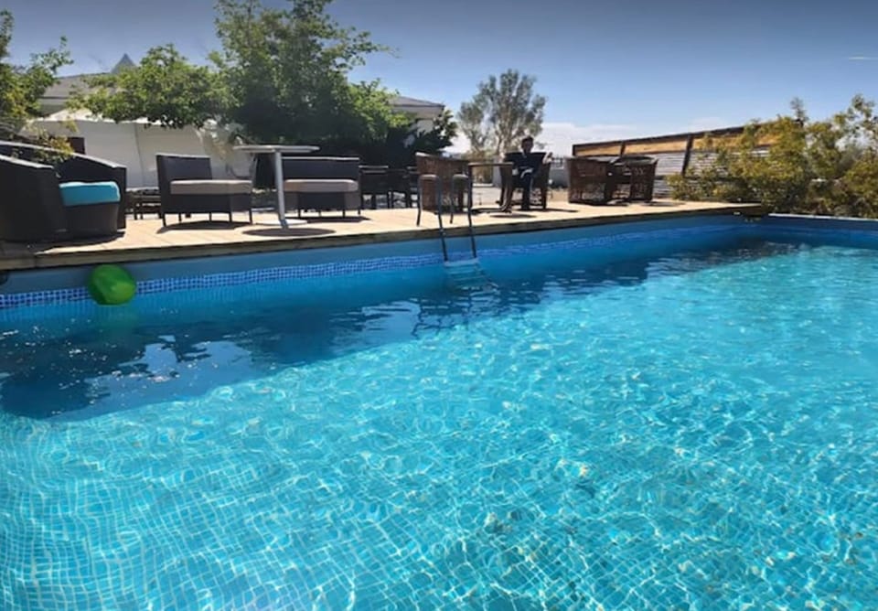 Pool is 16' by 32' and 4.5 feed deep across. 