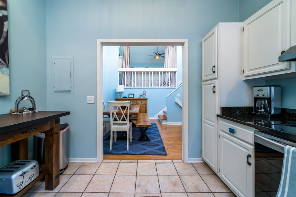 The kitchen and dining area flow together for a great gathering spot.
