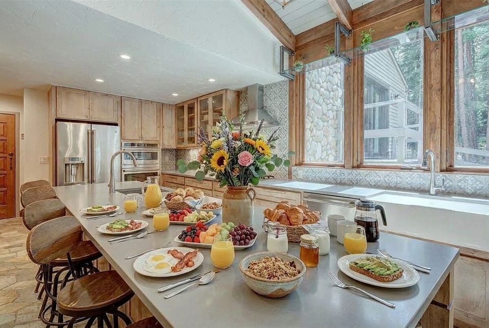 Culinary Excellence — Our fully stocked kitchen is a testament to our commitment to your exceptional stay. It offers an array of utensils and equipment, allowing you to indulge in the art of cooking in a space that feels like home. 🍓🍾