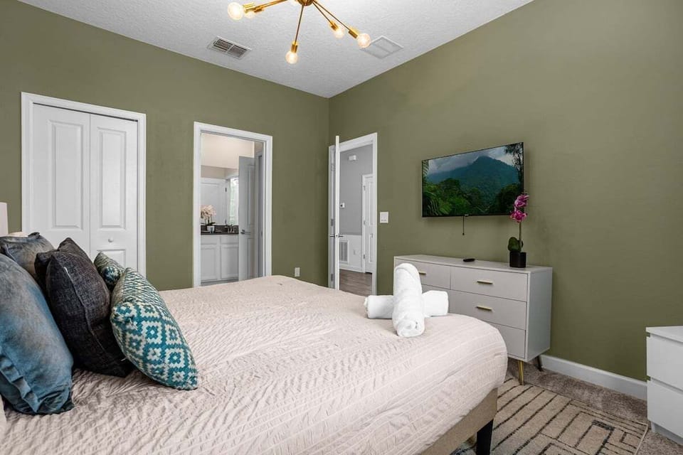 king bed with bathroom beside