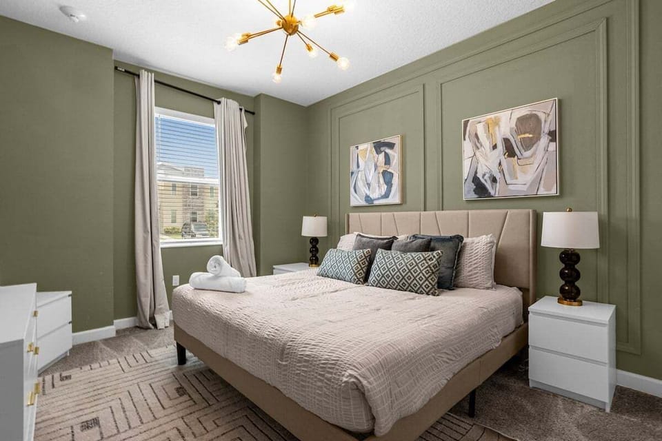 king bed with bathroom beside