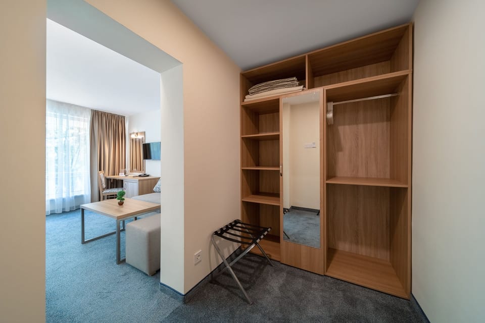 Family Double Room | Minibar, desk, laptop workspace, blackout drapes
