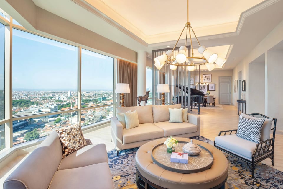Executive Suite, 2 Bedrooms | Living room | 48-inch LCD TV with cable channels, TV