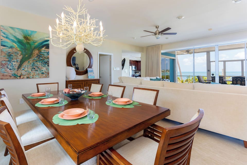 Formal dining area with seating for 8 guests. 