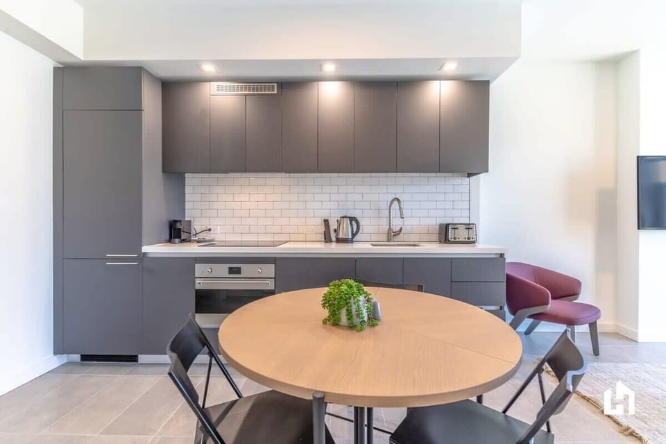 Whip up meals or plan adventures in this sleek, functional kitchen.