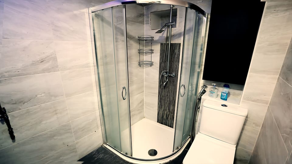 Shower, free toiletries, hair dryer, bathrobes
