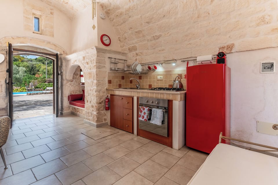 Full size oven, fridge freezer, Nespresso capsule coffee maker, kettle, etc.