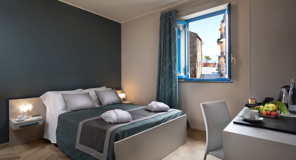 Deluxe Double Room, Mountain View | Premium bedding, minibar, in-room safe, desk