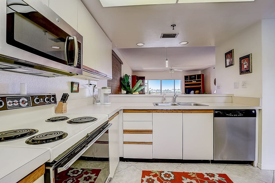 Kitchen Kitchen Kitchen with white cabinets and counter top. View to living room.