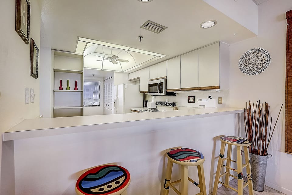Kitchen Counter Kitchen Counter Kitchen counter pass through with barstools.
