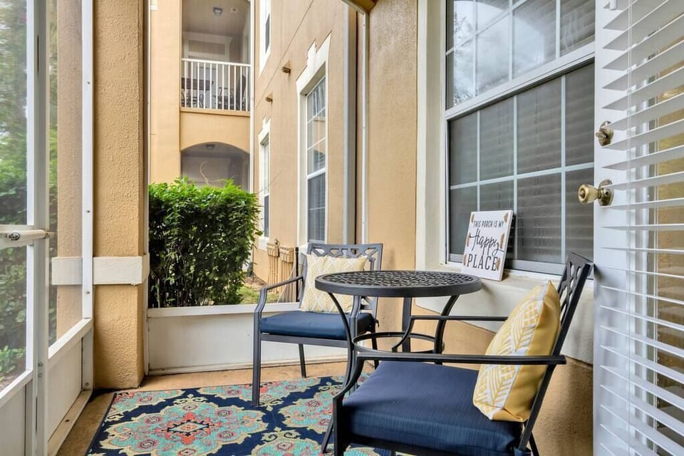 Screened in porch to relax with a drink.